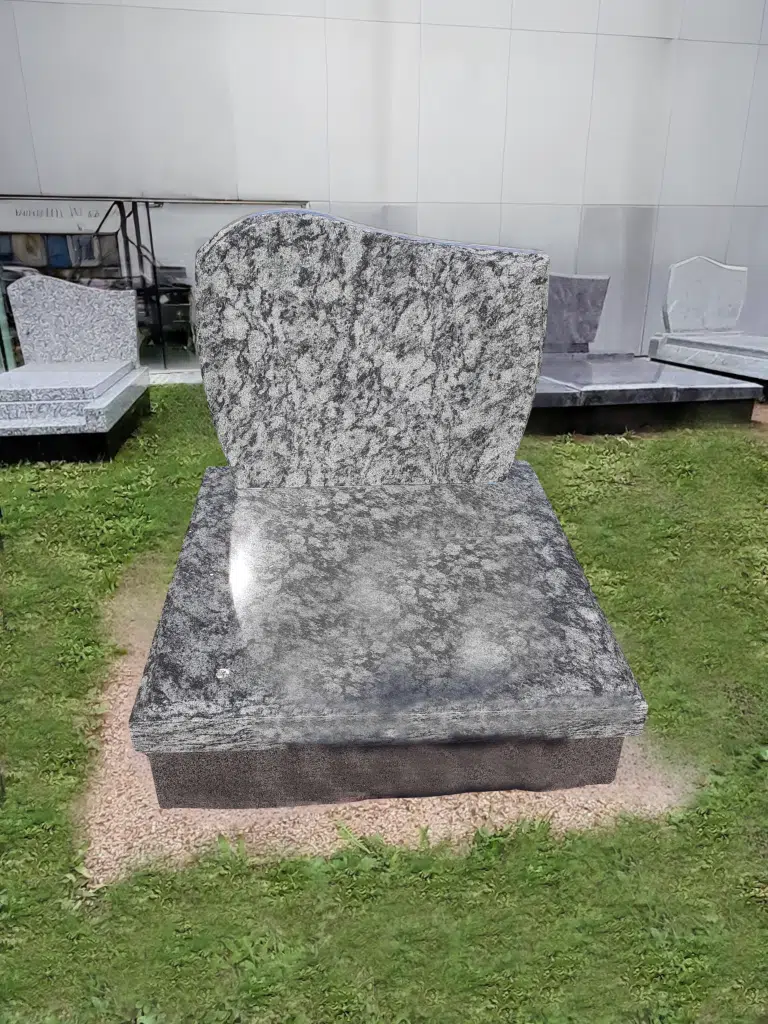 Sépulture cinéraire compacte en granit gris veiné de style moderne.